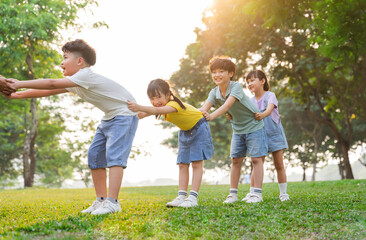 group image of cute asian children playing in the park