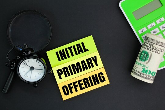 calculator, bell clock, calculator and paper money with the words initial primary offering