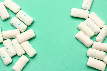 Fresh chewing gums on turquoise background