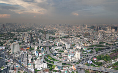 Fototapeta na wymiar At the sunset time with the High angle view in heart of Bangkok view from Baiyoke Sky Tower formerly highest building in Thailand.