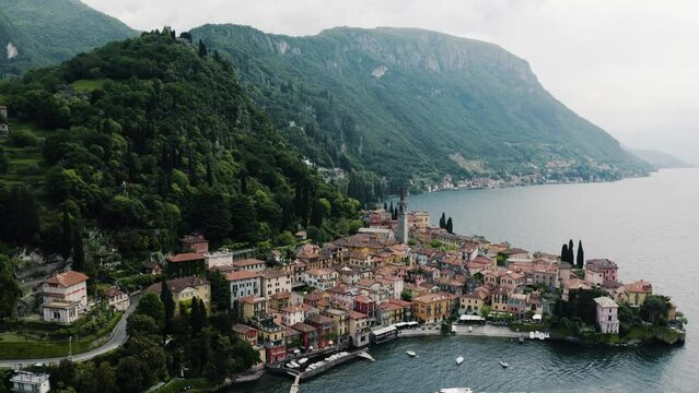 Drone shot pushing towards Varenna, Italy on Lake Como.