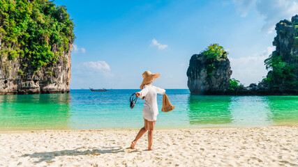 Happy traveler woman on vacation beach joy fun nature view scenic landscape Ko Hong island Krabi,...