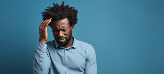 Afro american man with headache or discomfort on blue solid color background.  Image generative AI.
