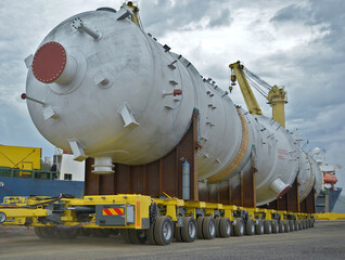 HUge vessels are transported to a Gas Conditioning plant at a Victorian refinery.