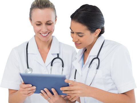 Digital png photo of happy diverse female doctors looking at tablet on transparent background