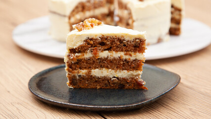 Classic carrot cake with cream cheese frosting, pecan, walnut and raisin