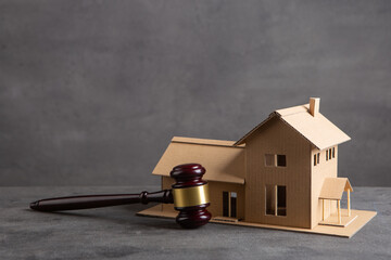 House model and gavel on the desk, Real property law concept, real estate auction - 625778678