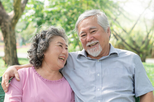 Healthy asian senior couple smiling with happiness