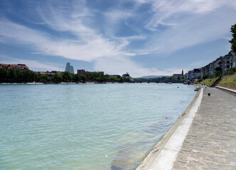 Swiss. Along the Rhine Promenade in Basel..The Middle Bridge (Mittlere Brücke) . Right - Medieval...
