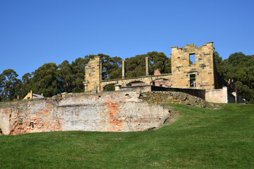 Fototapeta na wymiar landscape portrait of historical settler colony prison ruins in port Arthur site in Tasmania, Australia 