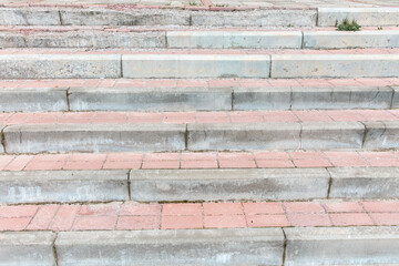 Broken red brick stairs in the city, abstract background for design