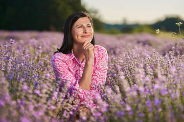 Brunette woman in a lavender field