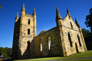 Fototapeta na wymiar ruins of an old stone church building at port Arthur Tasmania, Australia.