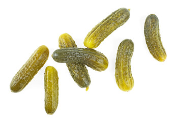 Marinated pickled cucumbers isolated on a white background. Gherkins, top view.