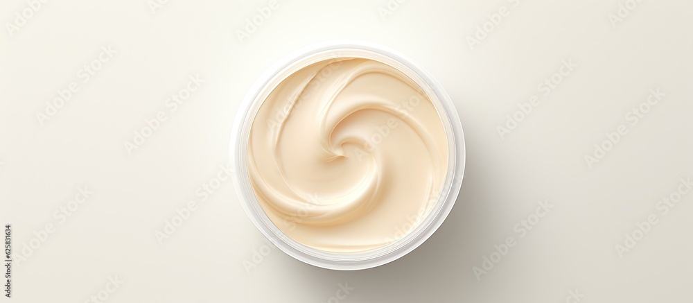 Aufkleber photo of a cup of cream on a clean white surface with empty space for text or other elements with co