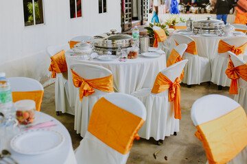 Setting up for the ultimate wedding venue in house. Outdoor wedding setup.