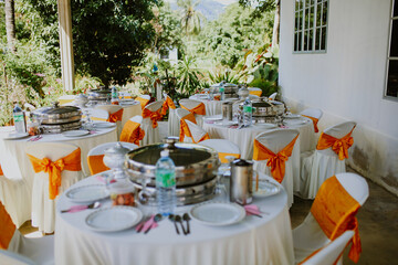 Setting up for the ultimate wedding venue in house. Outdoor wedding setup.