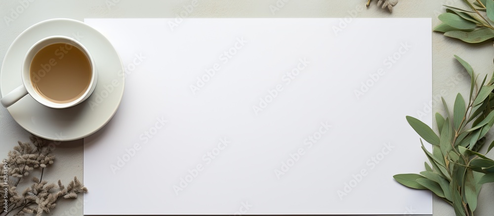 Poster photo of a coffee cup next to a blank paper, perfect for adding your own notes or doodles with copy 