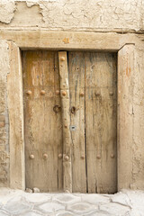 Fototapeta na wymiar a small broken door in a historical place