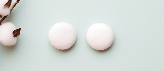 Photo of three white eggs on a table with plenty of copy space with copy space