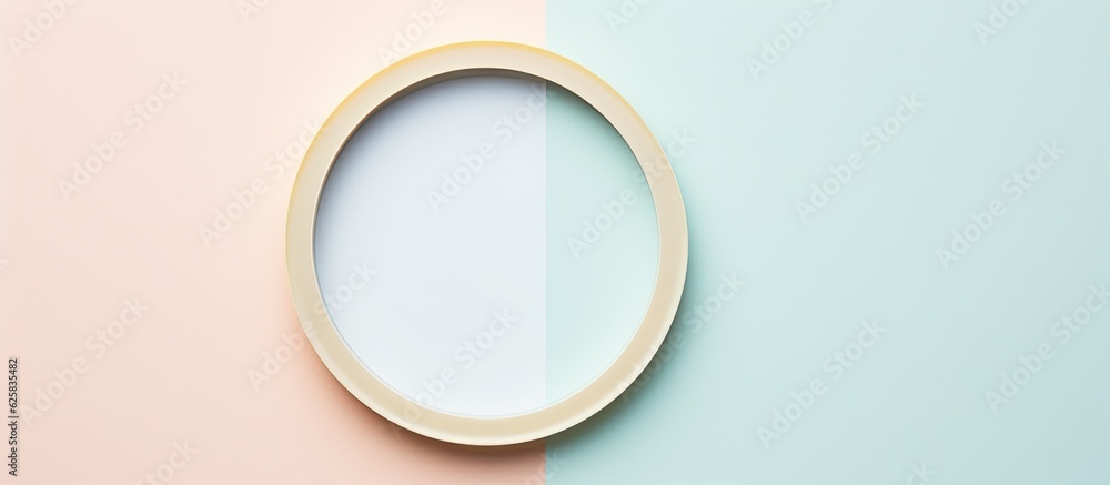 Poster photo of an oval mirror on a pastel wall with ample space for creative additions with copy space