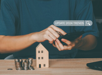 Businesspeople touching to search engine bar with 2024 trends wording for marketing monitor and...