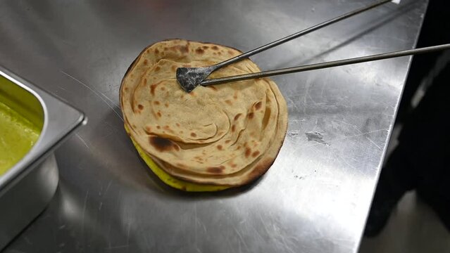 Freshly made tandoor bread is baked in a clay oven and served with Indian and Asian cuisines.