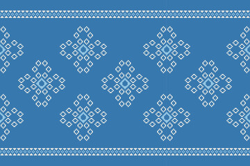 Ethnic geometric fabric pattern Cross Stitch.Ikat embroidery Ethnic oriental Pixel pattern navy blue background. Abstract,vector,illustration. Texture,clothing,frame,decoration,motifs,silk wallpaper.