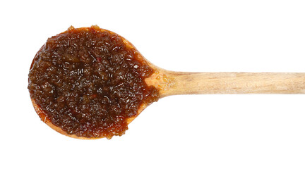 Olive jam, marmalade in wooden spoon isolated on white, top view