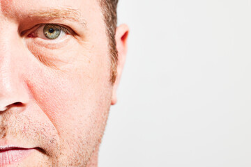 Obraz premium Closeup of male face in half