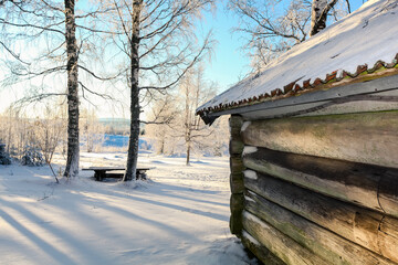 wooden traditional log house  house knot in winter time