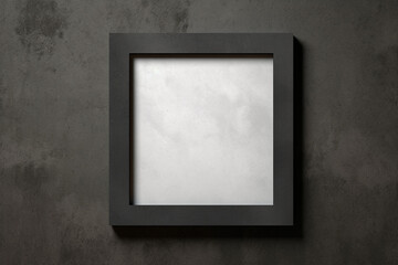 Black square picture frame hanging on a dark concrete wall