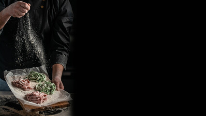 cooking homemade pasta. powdering by flour on a dark background. home cooking concept. Long banner format