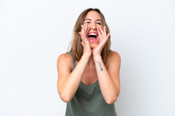 Young caucasian woman isolated on white background shouting and announcing something