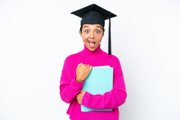Young student hispanic woman holding a books isolated on white background with surprise facial expression
