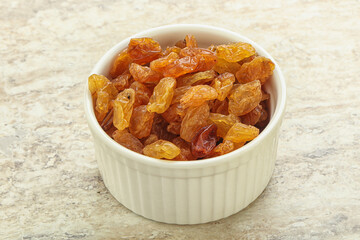 Sweet yellow raisin in the bowl