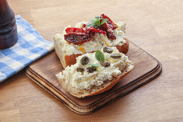 bruschetta with soft cheese capers and tomato