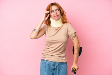 Young caucasian woman wearing neck brace isolated on pink background having doubts and thinking