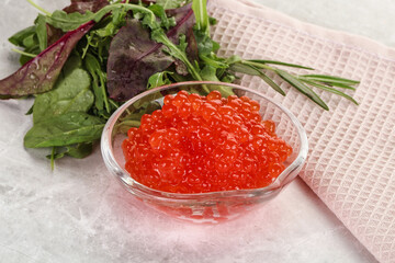 Red caviar in the bowl