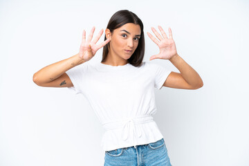 Young caucasian woman isolated on white background counting nine with fingers