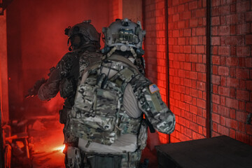 United States Army ranger during the military operation. Professional marine soldiers training with...