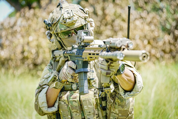 United States Army ranger during the military operation. Professional marine soldiers training with...