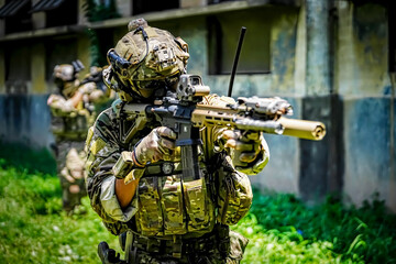 United States Army ranger during the military operation. Professional marine soldiers training with...