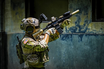 United States Army ranger during the military operation. Professional marine soldiers training with...