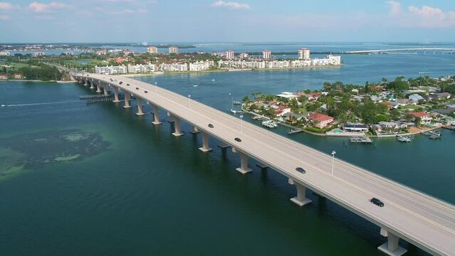 Drone flight following along Corey Causeway Bridge approaching the beach in Pinellas County