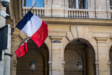 French flags, Palais-Royal, a former French royal palace located on Rue Saint-Honoré in the 1st...