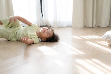 little girl playing freedom at home. the child playing high quality photo