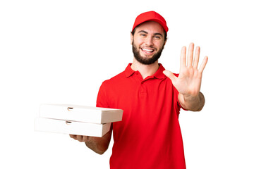 pizza delivery man with work uniform picking up pizza boxes over isolated chroma key background counting five with fingers