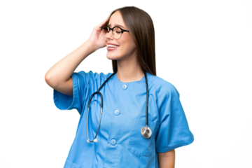 Young nurse caucasian woman over isolated background has realized something and intending the solution