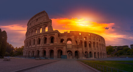 Fototapeta premium Colosseum in Rome. Colosseum is the most landmark in Rome at sunrise - Rome, Italy